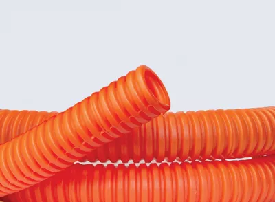 DKC - Труба ПНД гибкая гофр. д.25мм, тяжёлая с протяжкой, 50м, цвет оранжевый
